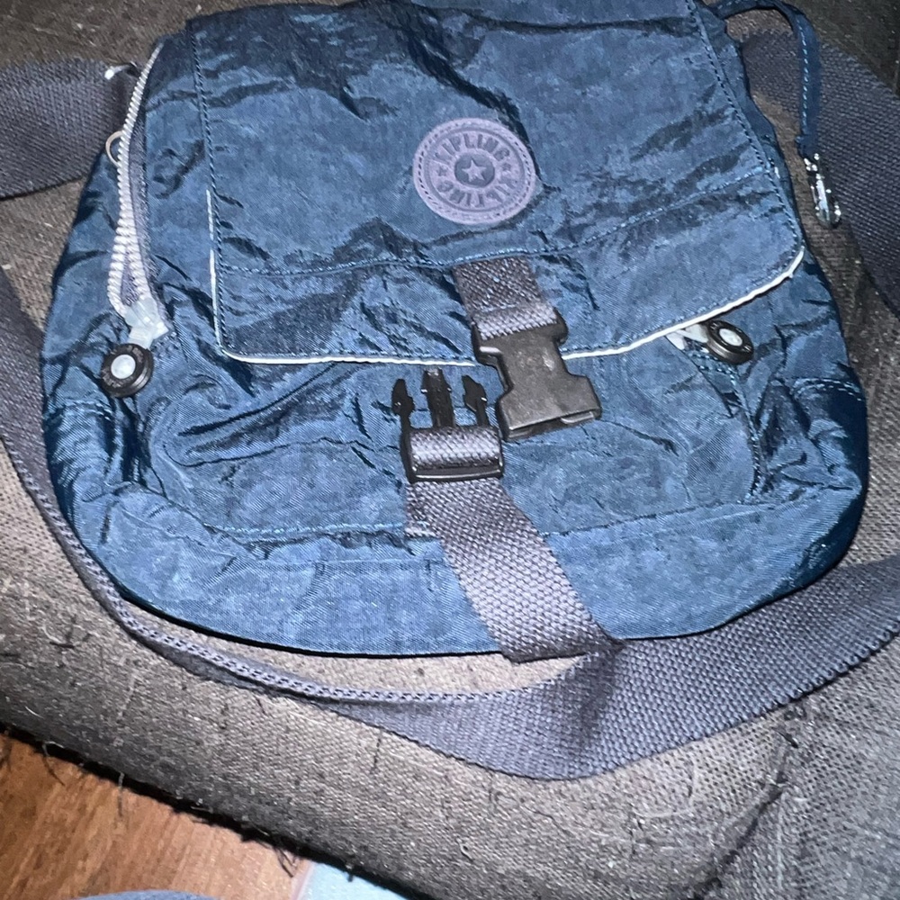 Kipling Blue Messenger Bag with Adjustable Strap and Flap Closure